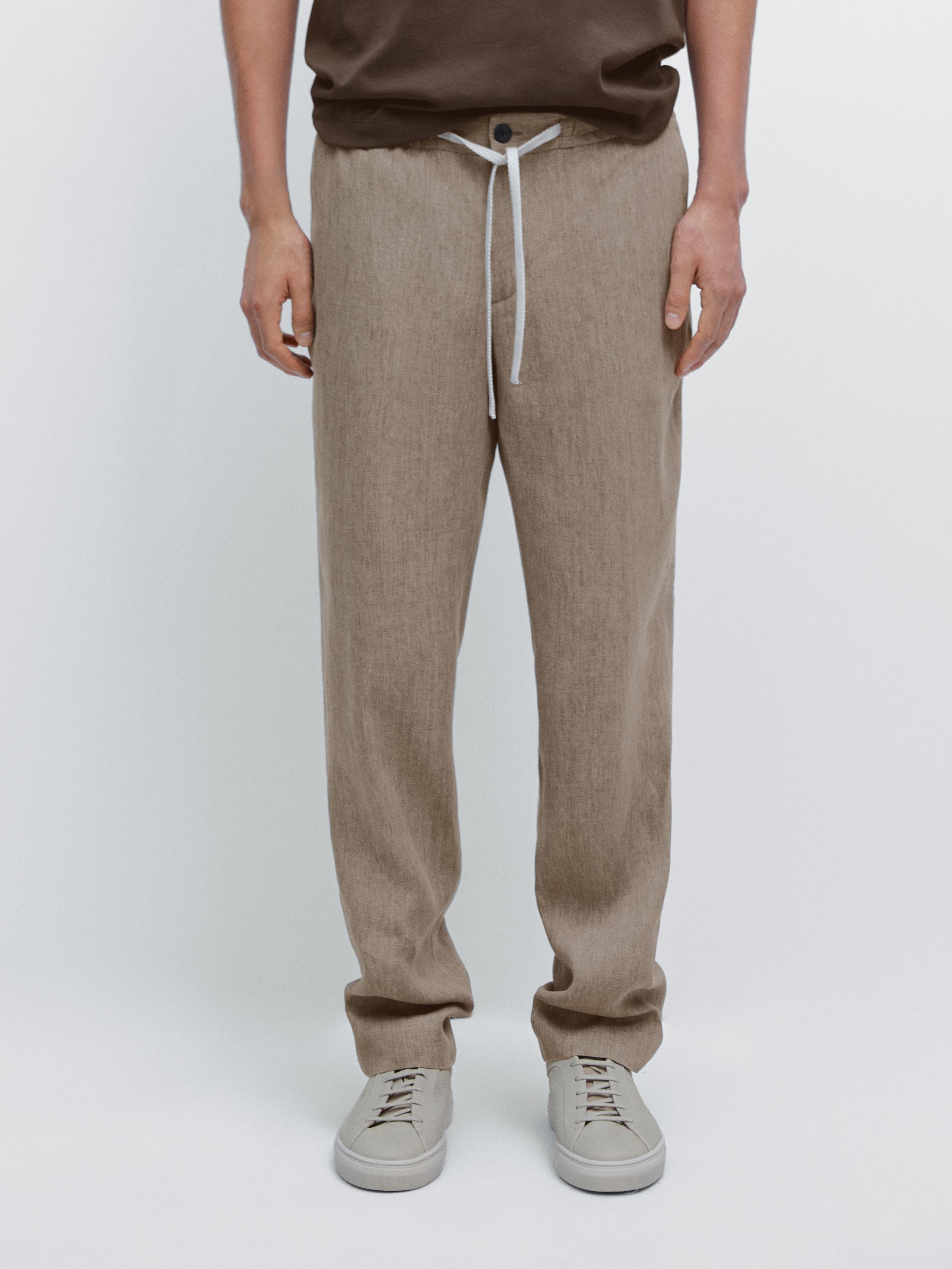 Faded total look linen trousers